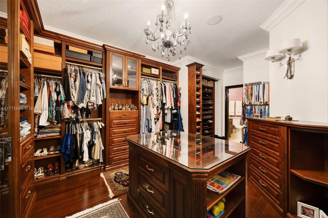 Bedroom converted into a spacious walk-in closet, with its own en-suite full bathroom