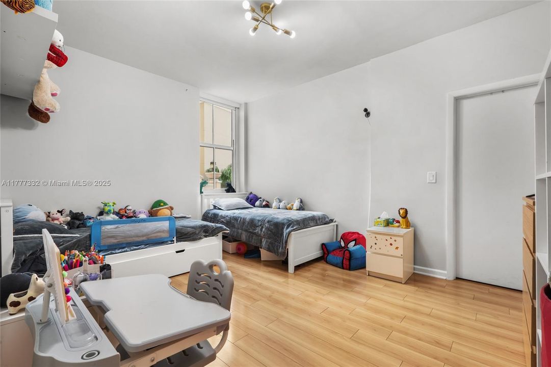 2nd bedroom in-suite with a big walking closet