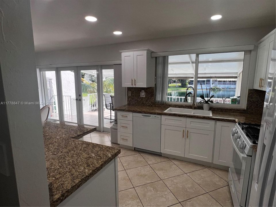 Kitchen with views to Lake Martha.