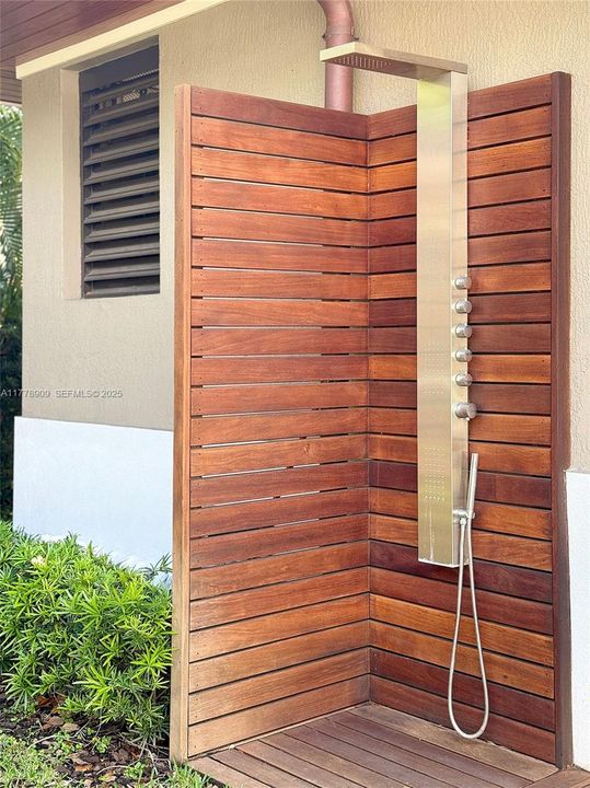 Outdoor shower by outdoor kitchen