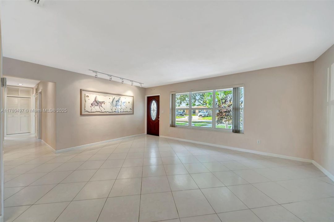 Living room and entry as seen from the Dining Room
