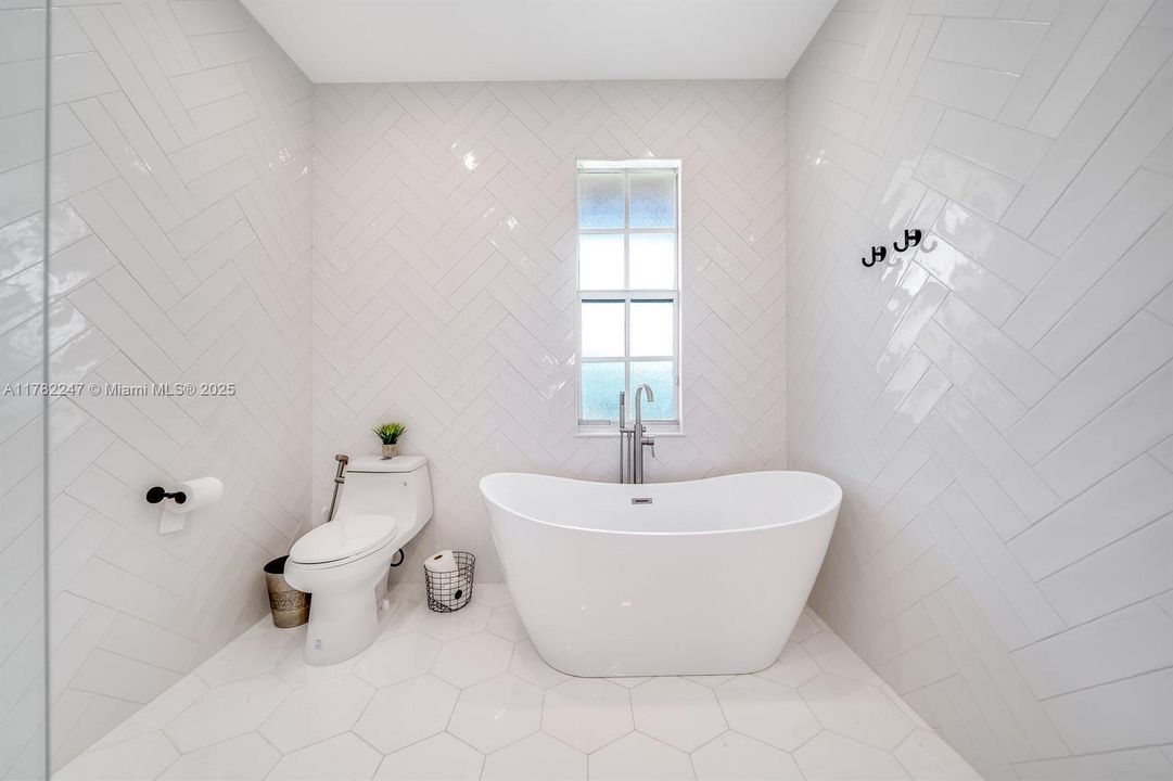 Updated primary Bathroom feels like a spa!