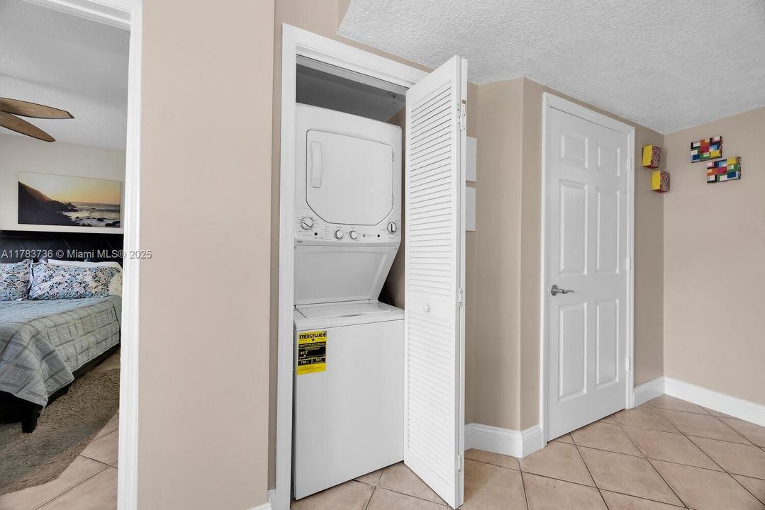 Washer/ dryer located in the apt unit off of the living room area.