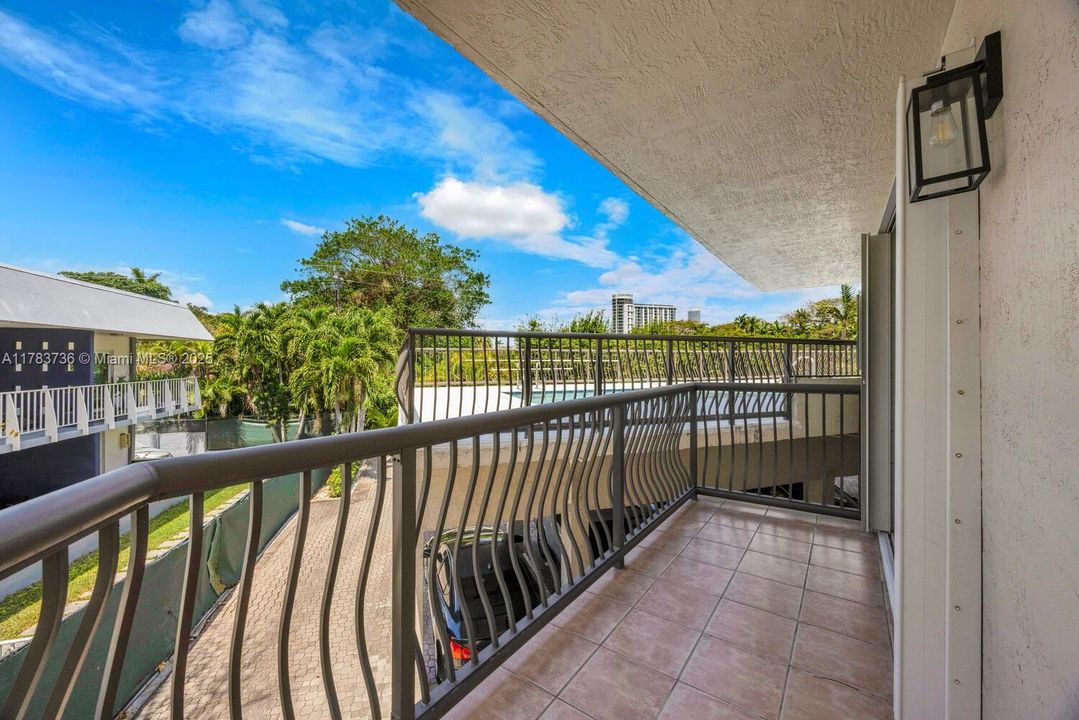 Private "L" shaped balcony. Full hurricane shutters for piece of mind.