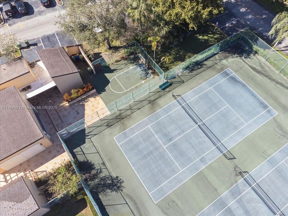 one tennis court was converted into two Pickleball courts