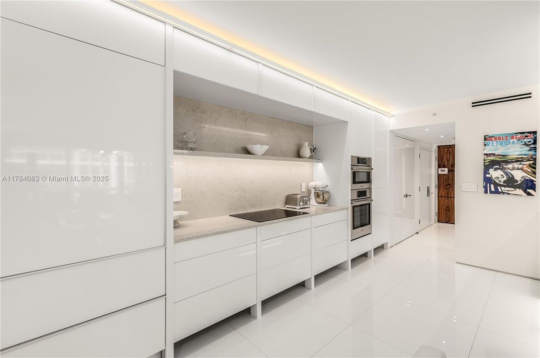 All new built in cabinets, gorgeous backsplash and counters.