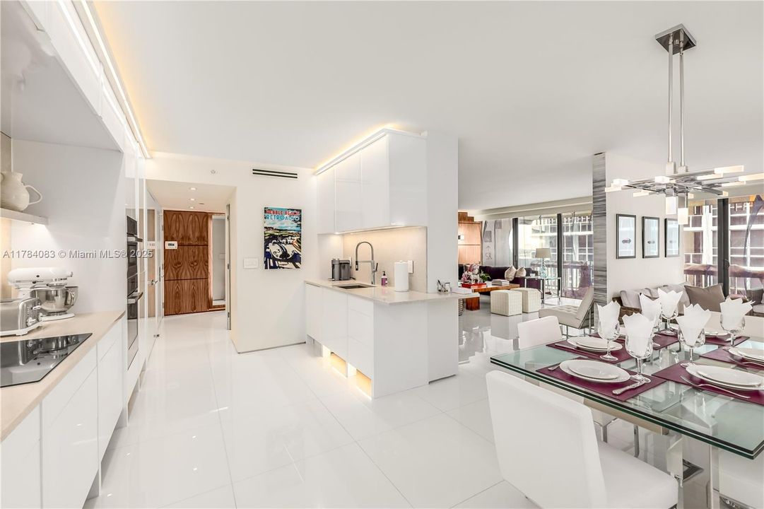 Custom kitchen and open dining room, great for entertaining..