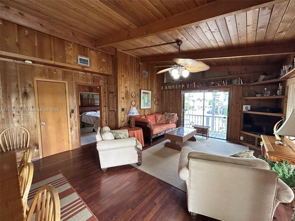 Glass Doors open to Wrap-around Porch