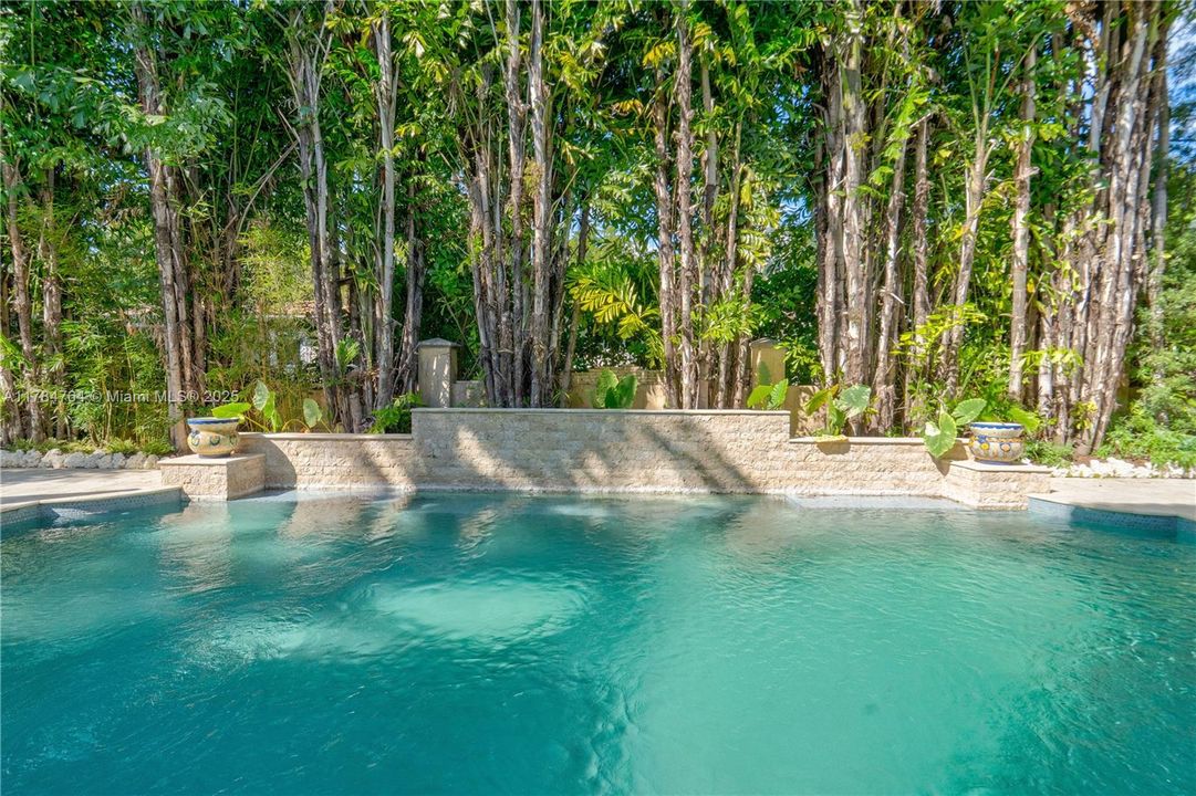 All tiled pool with waterfall