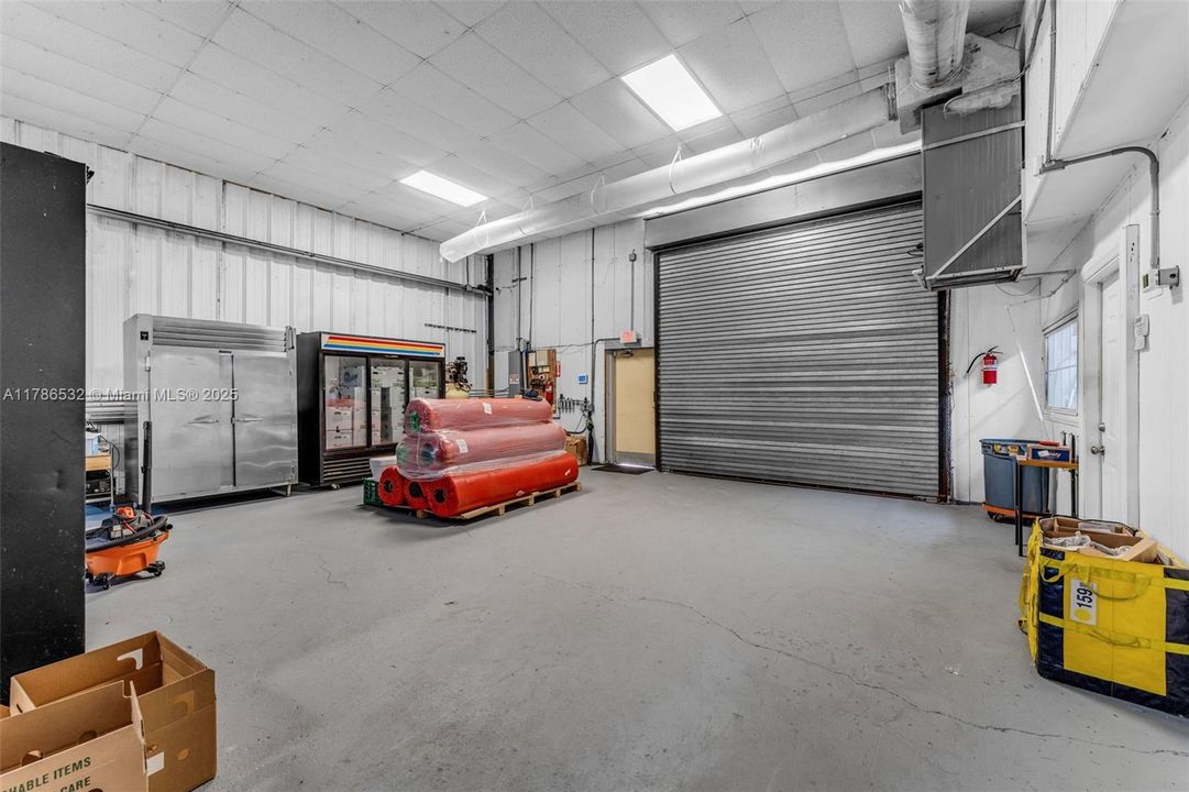 BLDG 2 1 SIDE FRONT VIEW OF DOOR. THIS BLDG IS SEPERATED IN HALF CAN BE OPENED EASILY. THE OTHER SIDE IS RENTED BY HYDRO GUY ON MONTH TO MONTH