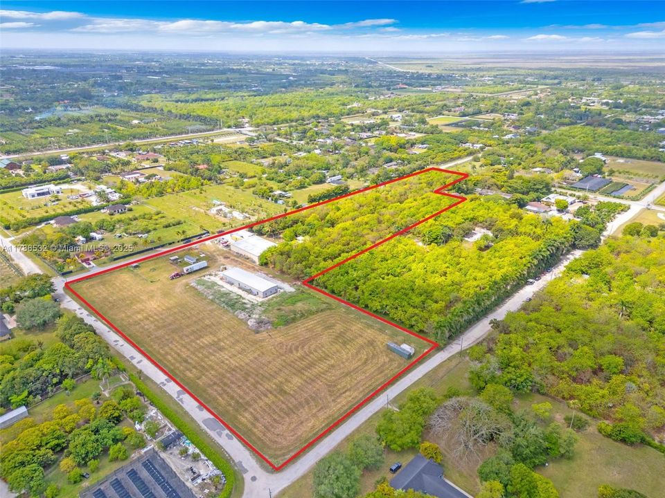 11.71 ACRE W/ 2 WAREHOUSES... A 7000 SQ FT AND A 4320 SQ FT BOTH HAVE 3 PHASE ELECTRIC PLUS. EQUIPPED WITH OFFICE, SEPTIC, BATH, A/C, WALK IN LARGE COOLER, MAMAY GROVE ON 20X30 CENTERS 5 ACRES OF CLEARED LAND DIESEL AND ELEC IRRIGATION PUMPS, , & MORE