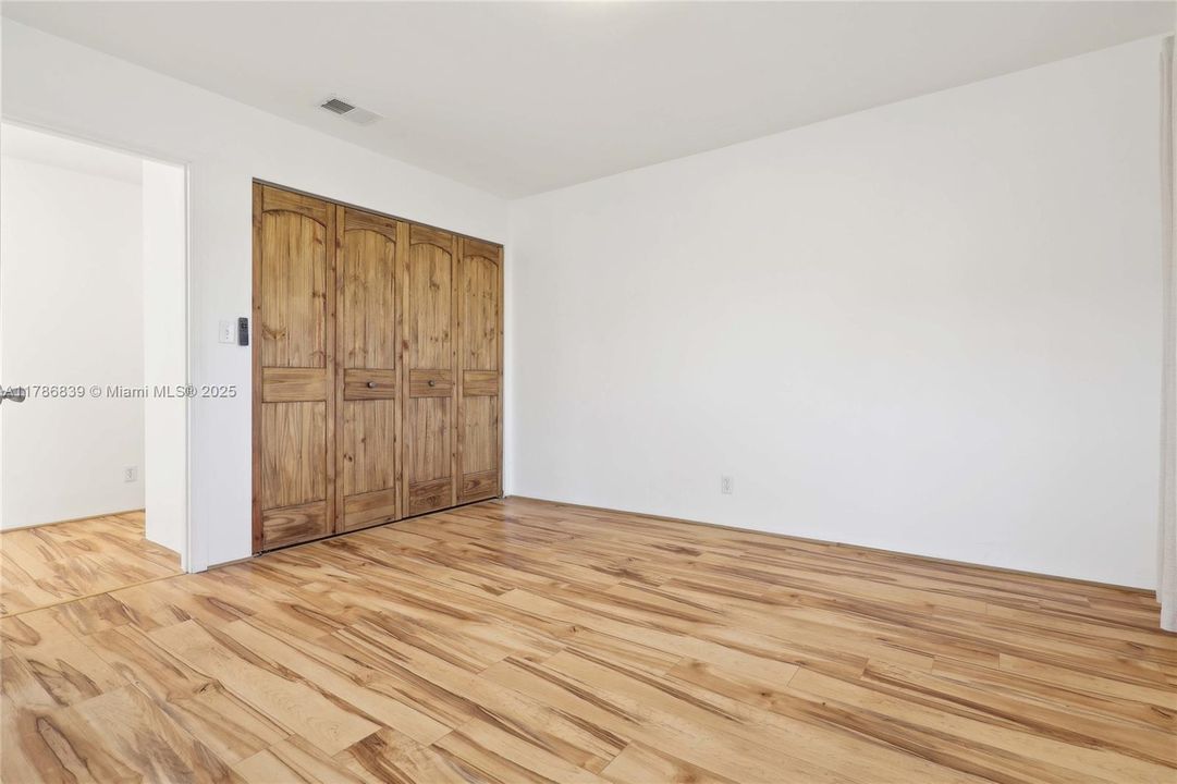 2 rooms converted to one big room, easily converted back to 2 separate rooms