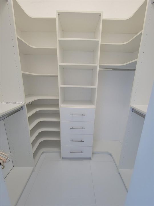 primary bedroom walk-in closet
