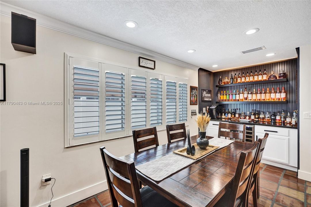 Family room has a 2nd dining area and a bar