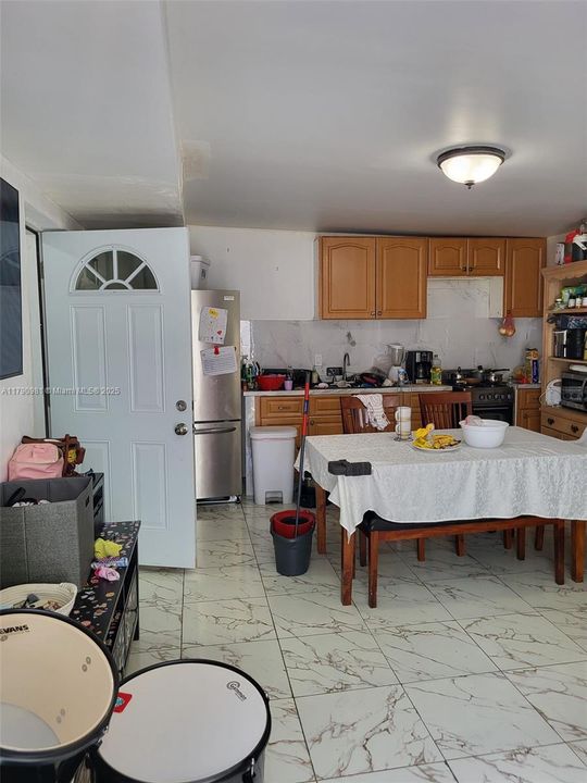 ENTRANCE TO THE EFFICIENCY BEDROOM WHICH IS THE CONVERTED MASTER BEDROOM