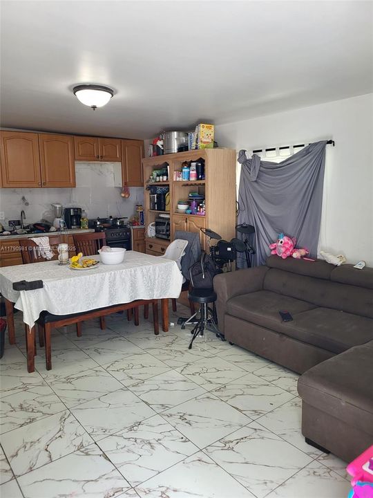 LIVING AREA AND KITCHENETT FOR THE EFFICIENCY