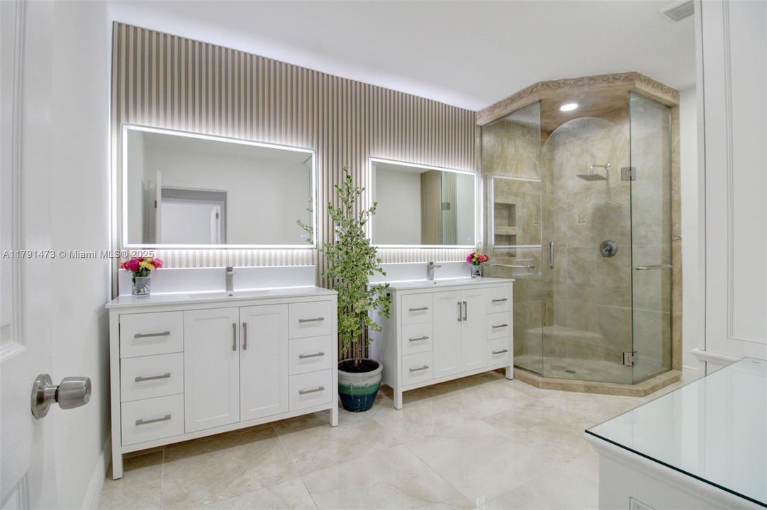 brand new double vanities with custom mirrors with lights