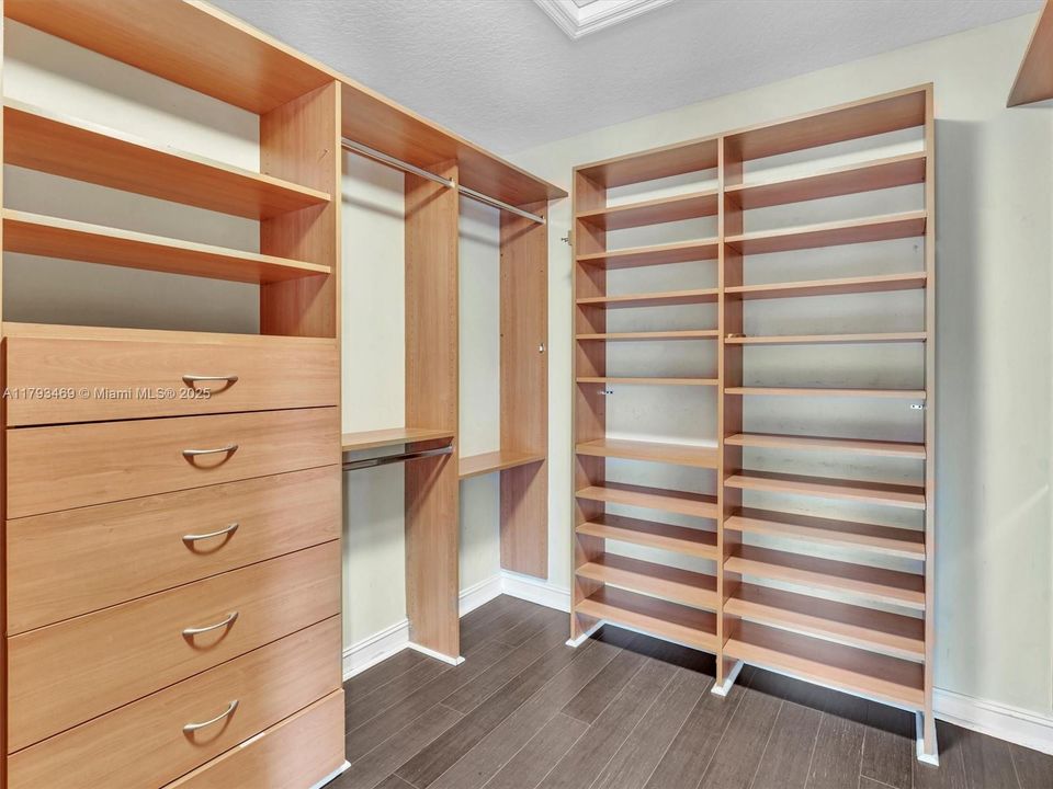 Very large custom walk in closet in the primary bedroom.