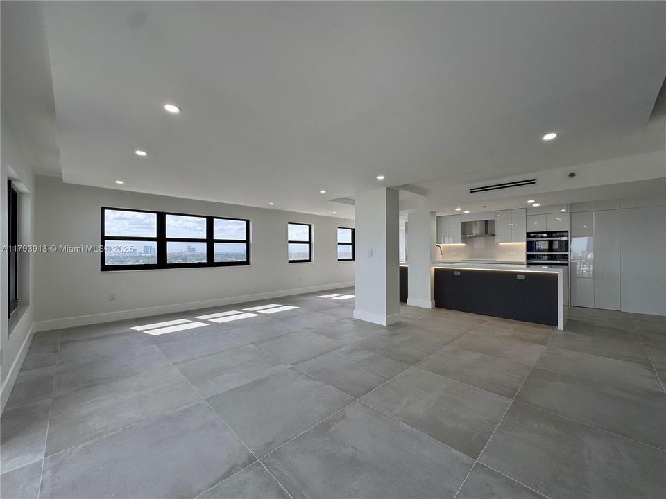 Windows facing Intracoastal and city lights at night