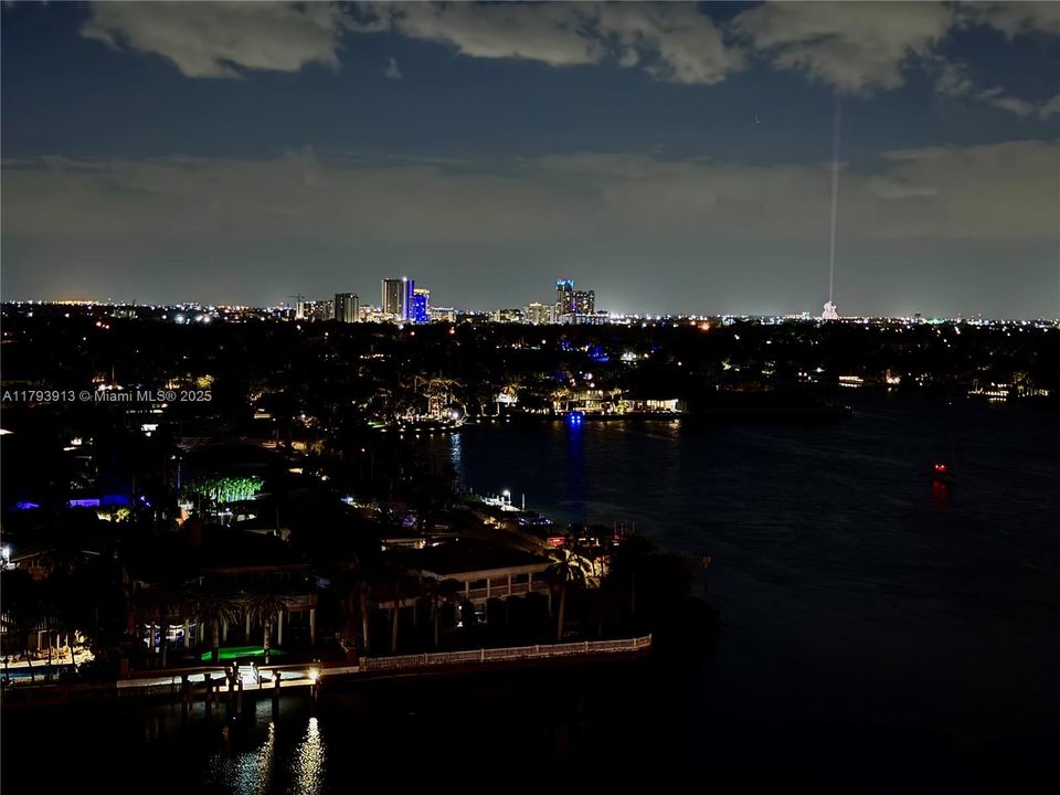 Nighttime view with the Hard Rock guitar and laser beam