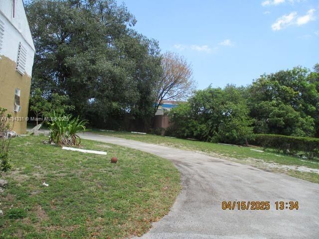 Rear wraparound behind the church, providing added access or utility area