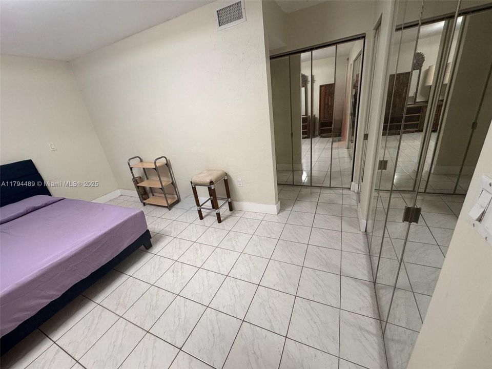 Primary bedroom ensuite with lots of closets