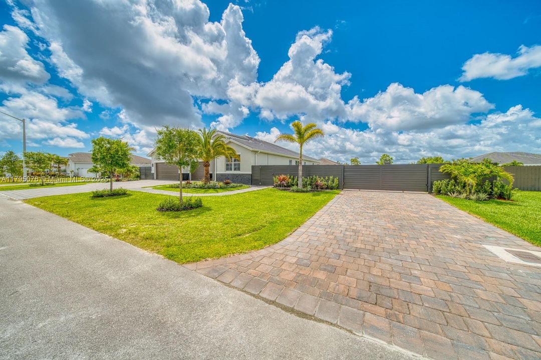 Side entrance — Right (paved for RV, boat, additional vehicle parking)