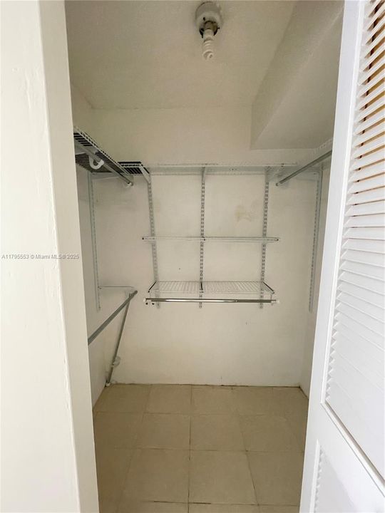 Primary Bedroom walk-in Closet