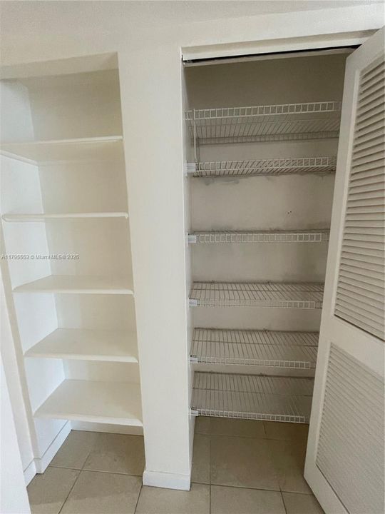 Primary bedroom storage and linen closet