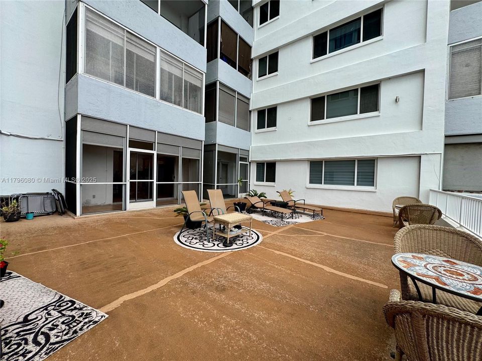 Patio with private, screened patio in background