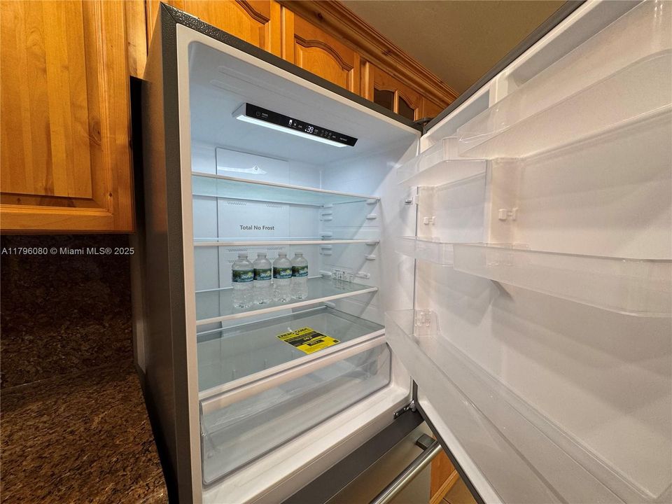 Brand new stainless steel fridge/freezer