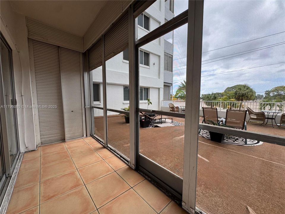 Private, screened patio with access to rarely-used common patio