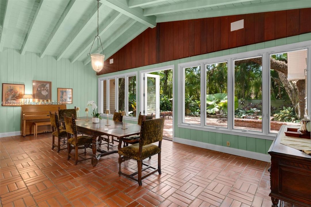 Enormous dining area leads to private courtyard setting
