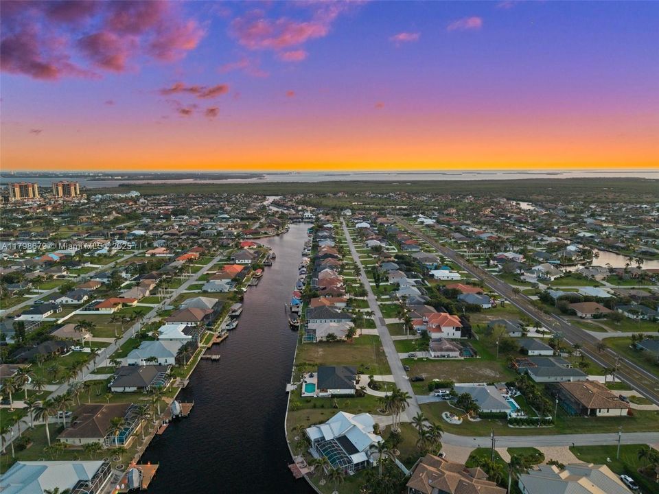 Overlooking the House, Canal, and Cape Harbour in the Evening