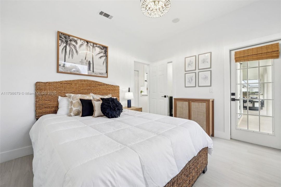 Bedroom 2 has ensuite lavatory, and Opens to the Lanai and Pool