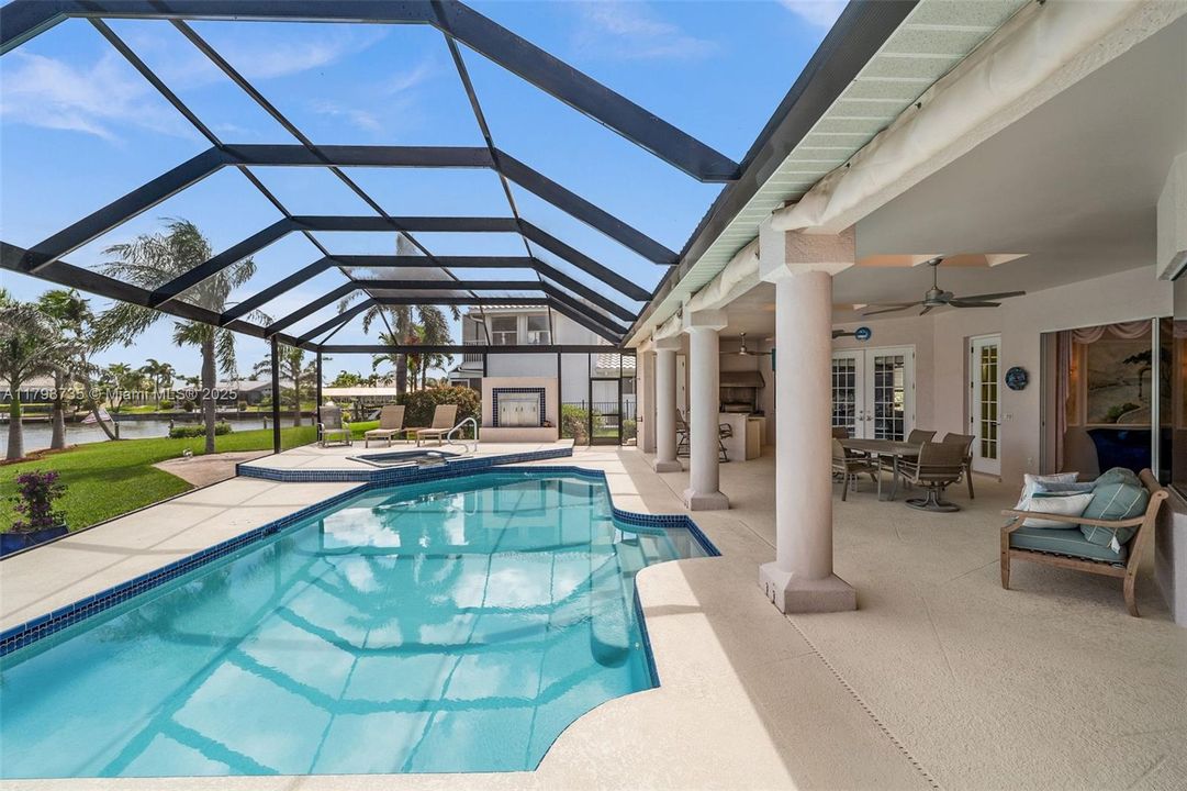 Large covered lanai steps from the pool