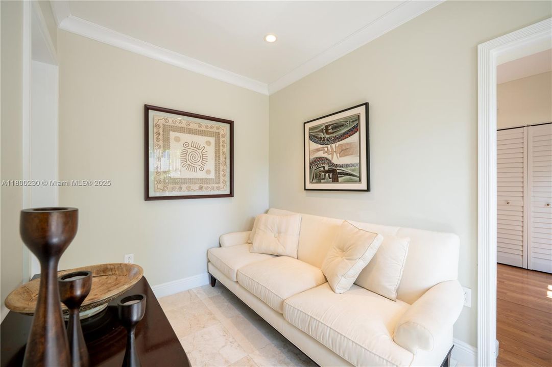 Sitting Area adjacent the Kitchen and Laundry Room  with Exit to the Outside Garden