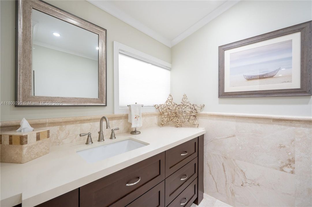 Marble Powder Room with Quartz Countertop