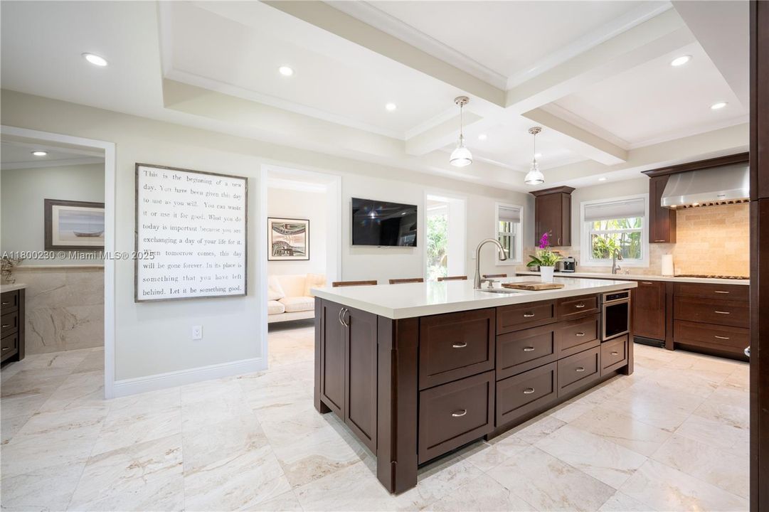 The Island's Built-in Microwave and Custom Cabinetry