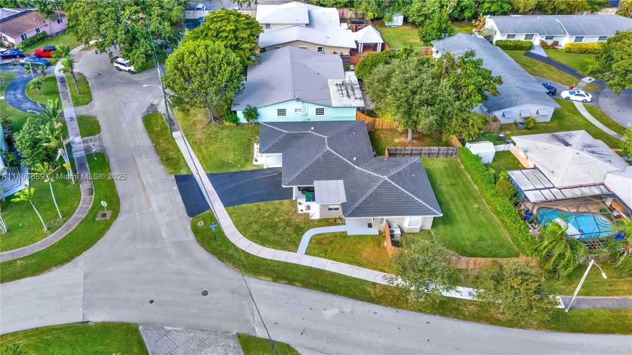 The east side duplex has a large fenced-in yard area.