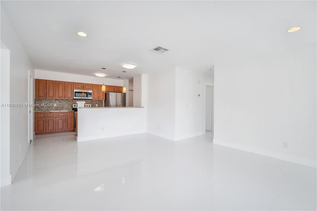 A view towards the kitchen from the open space