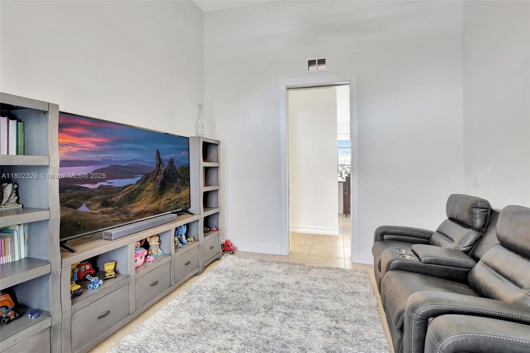 This space is currently used as an enclosed den, but could be a separate formal dining room, workout room, or whatever you desire