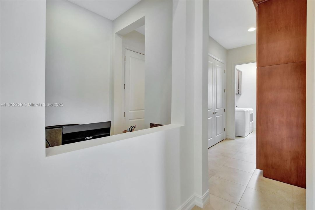 View off of Living Room of *Other/Workstation/Wet Bar space, mud room/hall, laundry