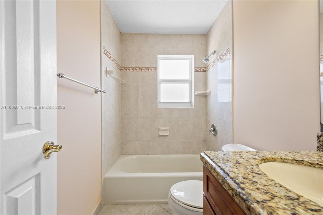 Door coming from the kitchen to the side backyard.