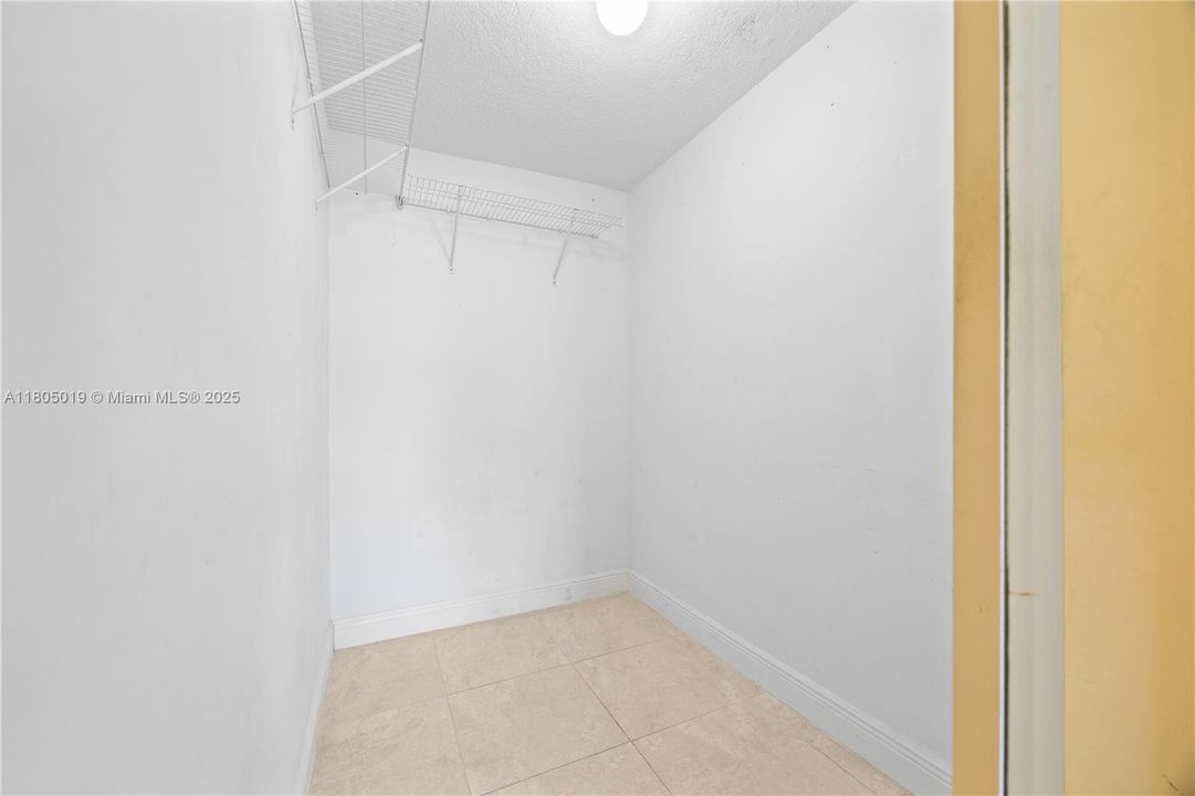 Kitchen and family room with high hats.