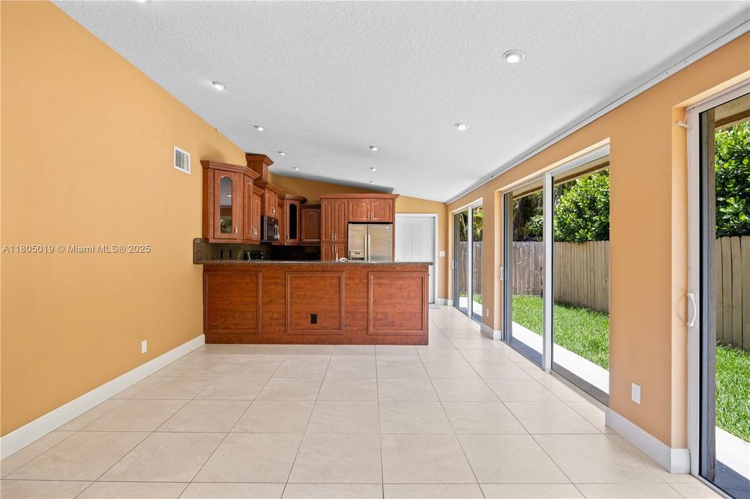 Top floor first bedroom with a long balcony and a wall-to-wall closet.