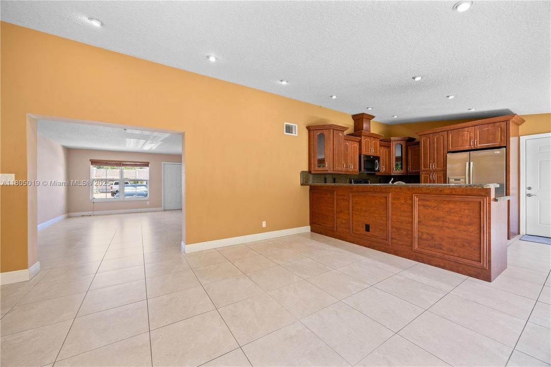 View of the living/dining area from the family room.