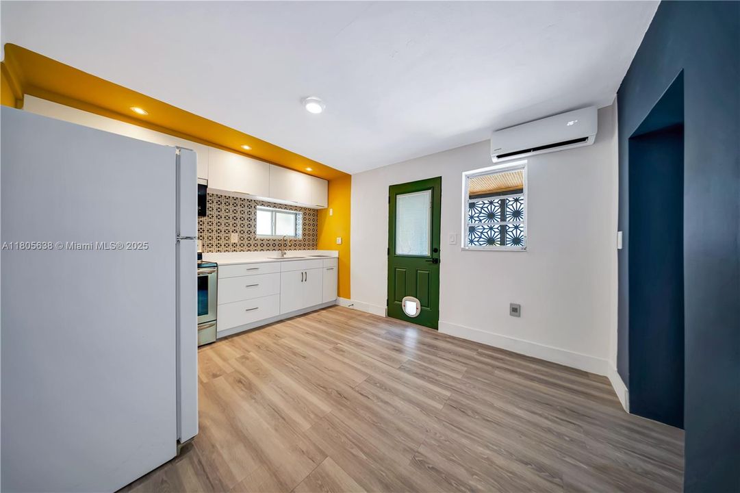 UNIT 5 KITCHEN AND ENTRANCE VIEW