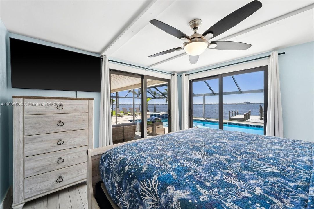 Bedroom 2 has dual Sliding Doors to the Lanai and Pool