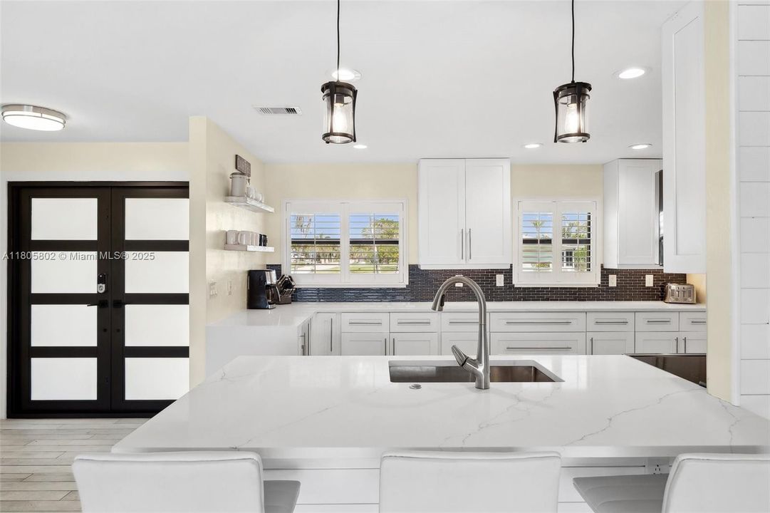 Looking from the Breakfast Bar toward the front door